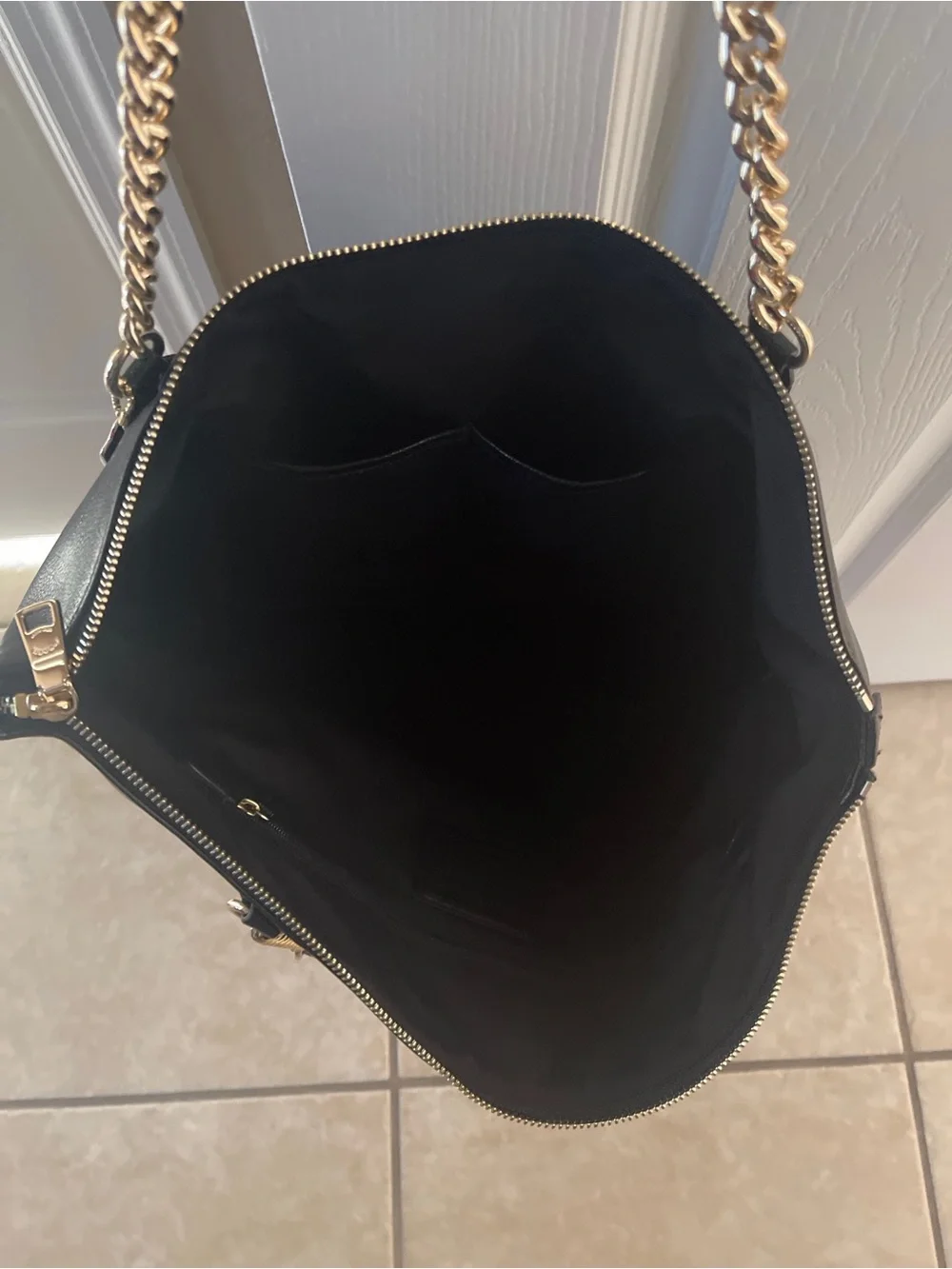 Coach sleek black